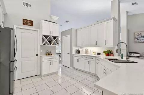Kitchen - 671 SE Pin Oak Ter, Stuart, FL 34997 photo 2 of 5