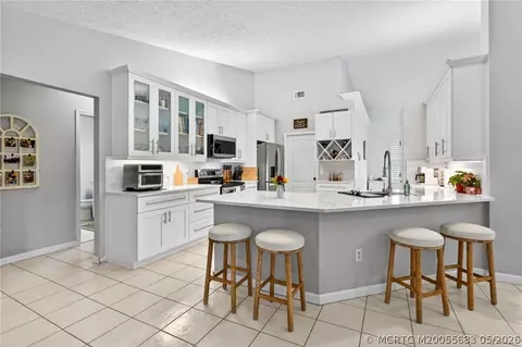 Kitchen - 671 SE Pin Oak Ter, Stuart, FL 34997 photo 2 of 6