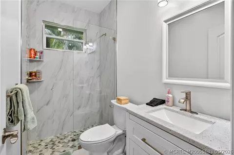 Bath - 671 SE Pin Oak Ter, Stuart, FL 34997 photo 6 of 7