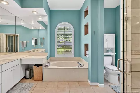 Bath - 671 SE Pin Oak Ter, Stuart, FL 34997 photo 1 of 7