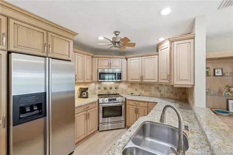Kitchen - 5600 SE Foxcross Pl, Stuart, FL 34997 photo 4 of 4