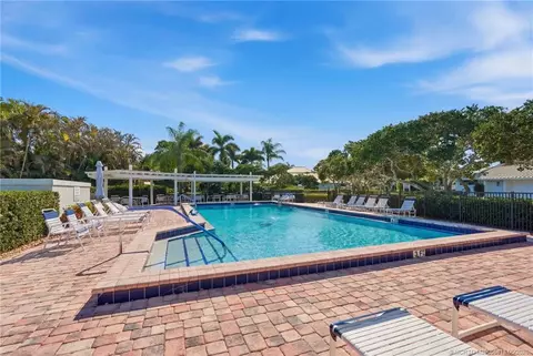 Exterior - 5600 SE Foxcross Pl, Stuart, FL 34997 photo 9 of 11