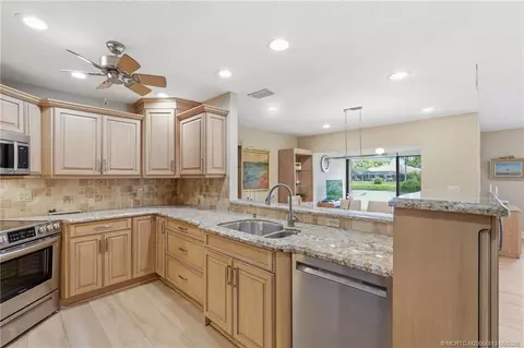 Kitchen - 5600 SE Foxcross Pl, Stuart, FL 34997 photo 2 of 4