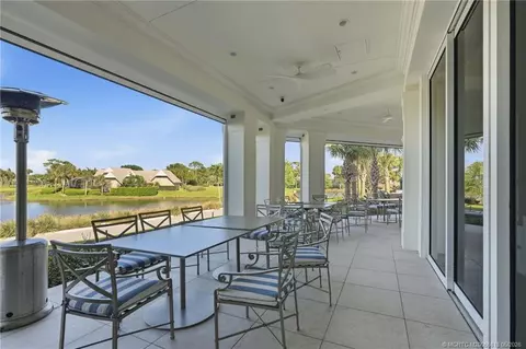 Exterior - 5600 SE Foxcross Pl, Stuart, FL 34997 photo 10 of 11
