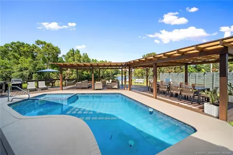 Exterior - 4401 SE Satinleaf Pl, Stuart, FL 34997 photo 9 of 19