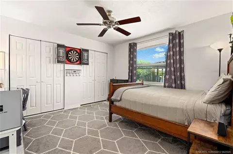 Bedroom - 4401 SE Satinleaf Pl, Stuart, FL 34997 photo 4 of 5