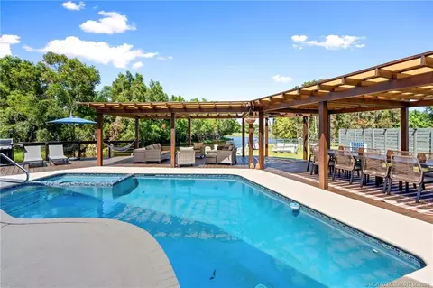 Exterior - 4401 SE Satinleaf Pl, Stuart, FL 34997 photo 7 of 19
