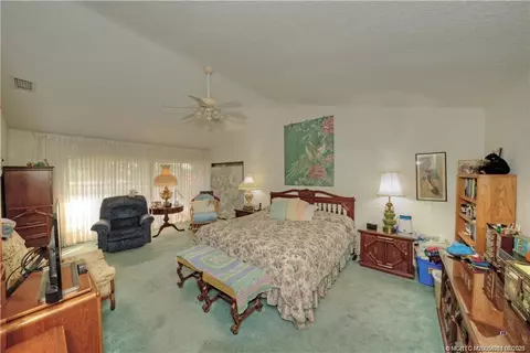 Bedroom - 5220 SE Burning Tree Cir S, Stuart, FL 34997 photo 1 of 4