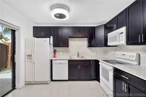 Kitchen - 5708 SE Windsong Ln, Stuart, FL 34997 photo 2 of 2