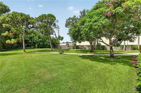 Exterior - 5708 SE Windsong Ln, Stuart, FL 34997 photo 6 of 7