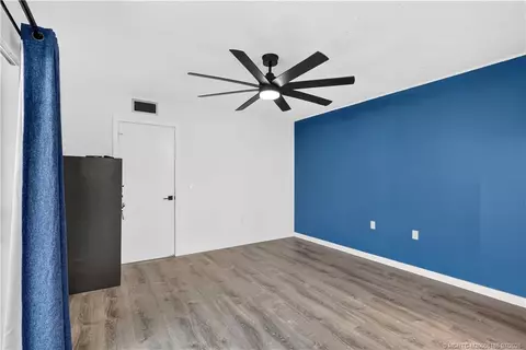 Bedroom - 5708 SE Windsong Ln, Stuart, FL 34997 photo 3 of 4