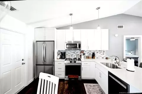 Kitchen - 6703 SE Raintree Ave, Stuart, FL 34997 photo 2 of 3