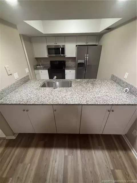 Kitchen - 702 NW Fork Rd, Stuart, FL 34994 photo 3 of 4