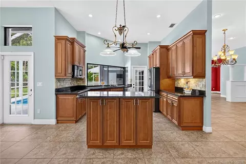 Kitchen - 672 SE Pin Oak Ter, Stuart, FL 34997 photo 2 of 7