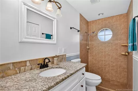 Bath - 672 SE Pin Oak Ter, Stuart, FL 34997 photo 7 of 7