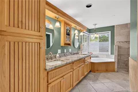 Bath - 672 SE Pin Oak Ter, Stuart, FL 34997 photo 1 of 7