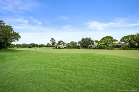 Exterior - 3378 SE Cambridge Dr, Stuart, FL 34997 photo 7 of 10