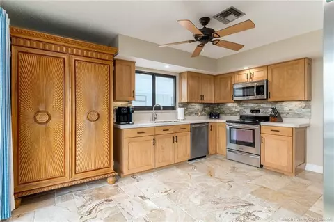 Kitchen - 4099 SE Centerboard Ln #4-B, Stuart, FL 34997 photo 3 of 6
