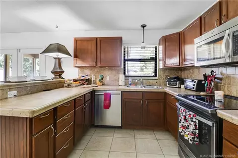 Kitchen - 5765 SE Rosemont Ave, Stuart, FL 34997 photo 3 of 6