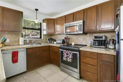 Kitchen - 5765 SE Rosemont Ave, Stuart, FL 34997 photo 2 of 6