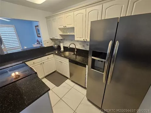 Kitchen - 5433 SE Miles Grant Rd #E-205, Stuart, FL 34997 photo 2 of 2