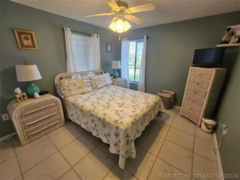 Bedroom - 5433 SE Miles Grant Rd #E-205, Stuart, FL 34997 photo 1 of 2