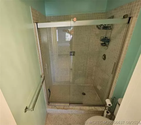 Bath - 5433 SE Miles Grant Rd #E-205, Stuart, FL 34997 photo 1 of 2