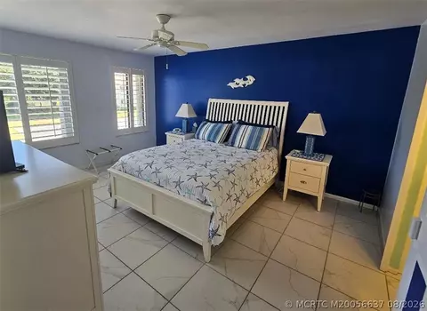Bedroom - 5433 SE Miles Grant Rd #E-205, Stuart, FL 34997 photo 2 of 2
