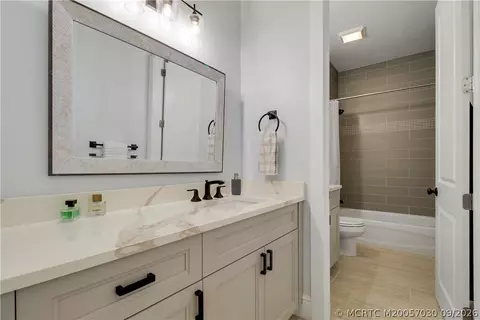 Bath - 1002 SE Riverside Dr, Stuart, FL 34996 photo 5 of 7