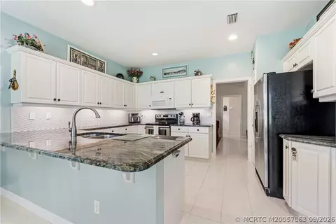 Kitchen - 3663 SE Cambridge Dr, Stuart, FL 34997 photo 1 of 2