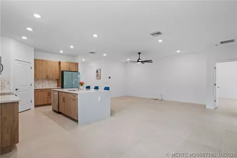Living - 7030 SE Park Trace Dr, Stuart, FL 34997 photo 2 of 9