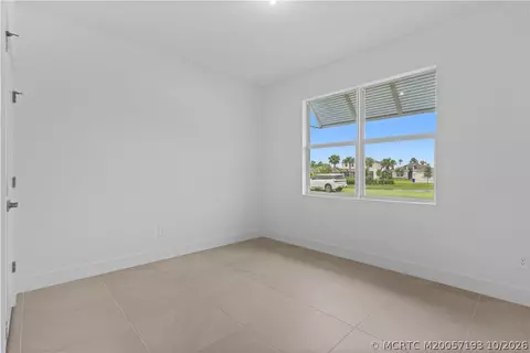 Bedroom - 7030 SE Park Trace Dr, Stuart, FL 34997 photo 4 of 7