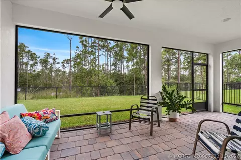 Exterior - 7030 SE Park Trace Dr, Stuart, FL 34997 photo 5 of 10
