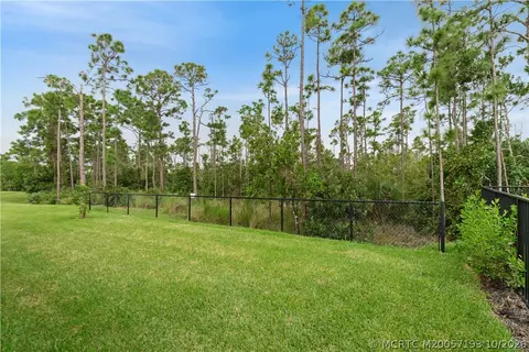 Exterior - 7030 SE Park Trace Dr, Stuart, FL 34997 photo 9 of 10