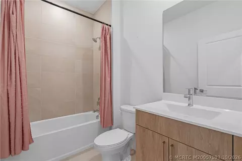 Bath - 7030 SE Park Trace Dr, Stuart, FL 34997 photo 1 of 4