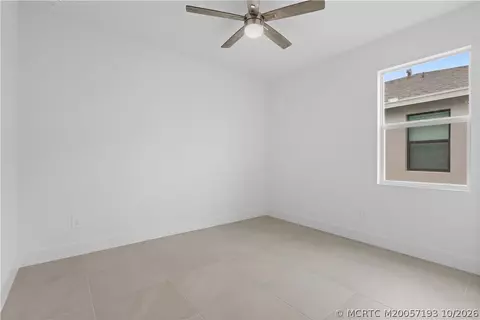 Bedroom - 7030 SE Park Trace Dr, Stuart, FL 34997 photo 1 of 7