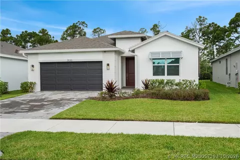 Exterior - 7030 SE Park Trace Dr, Stuart, FL 34997 photo 2 of 10