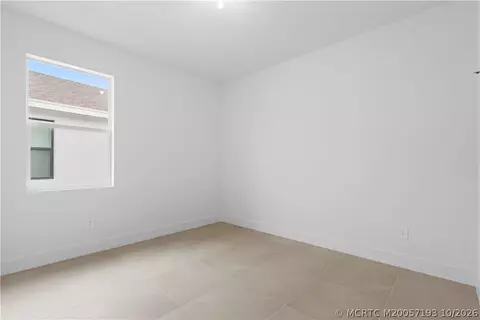 Bedroom - 7030 SE Park Trace Dr, Stuart, FL 34997 photo 6 of 7