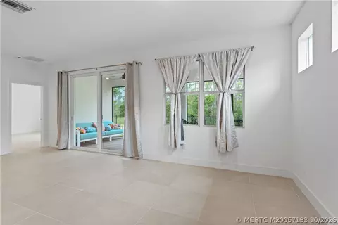 Living - 7030 SE Park Trace Dr, Stuart, FL 34997 photo 7 of 9