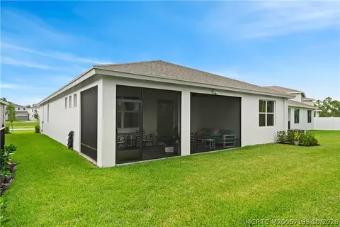 Exterior - 7030 SE Park Trace Dr, Stuart, FL 34997 photo 4 of 10