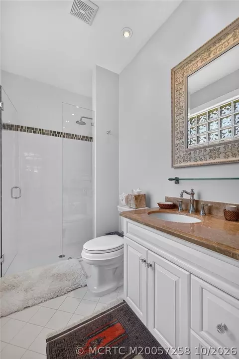 Bath - 6600 SE Barrington Dr, Stuart, FL 34997 photo 6 of 11