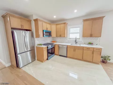 Kitchen - 413 E 9th Ave, Roselle, NJ 07203 photo 2 of 3