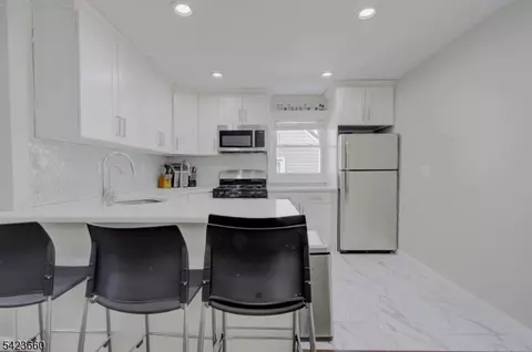 Kitchen - 15 John St, Passaic, NJ 07055 photo 2 of 2