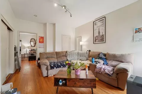 Living - 6 4th St, Passaic, NJ 07055 photo 1 of 1