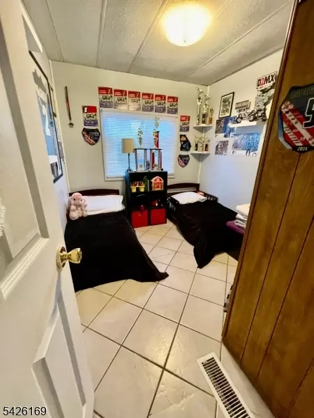 Bedroom - 22 Ambassador Dr, Wayne, NJ 07470 photo 1 of 7