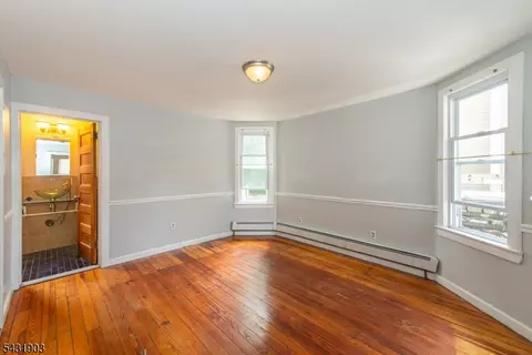 Living - 411 Berkeley Ave, Bloomfield, NJ 07003 photo 1 of 5