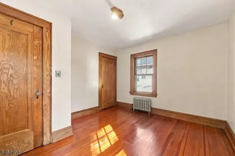 Bedroom - 82 Brook Ave, Passaic, NJ 07055 photo 6 of 6