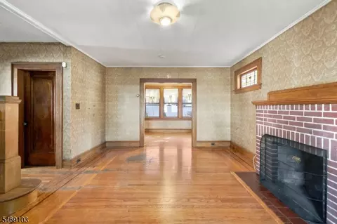 Living - 82 Brook Ave, Passaic, NJ 07055 photo 1 of 2