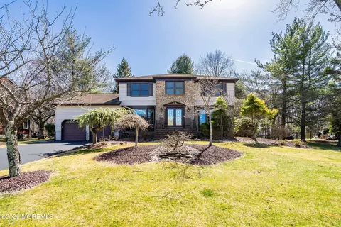 57 W Canadian Woods Rd, Manalapan, NJ 07726