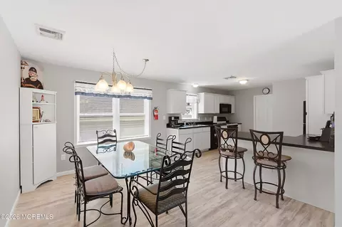 Dining - 334 E Bayview Ave, Ocean Gate, NJ 08740 photo 1 of 2